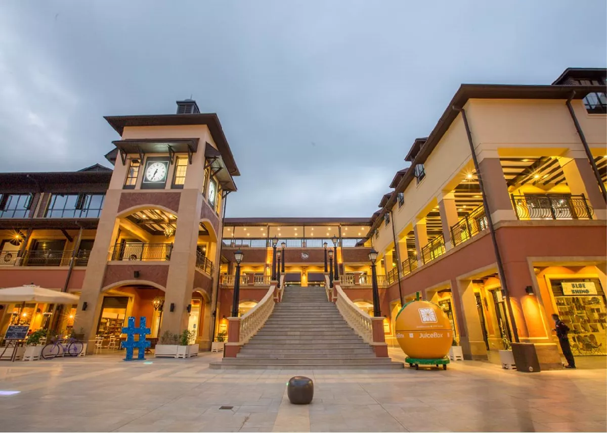 The Hub Karen exterior at dusk, home to The Hub Park, Nairobi's leading indoor funland and bounce trampoline centre.